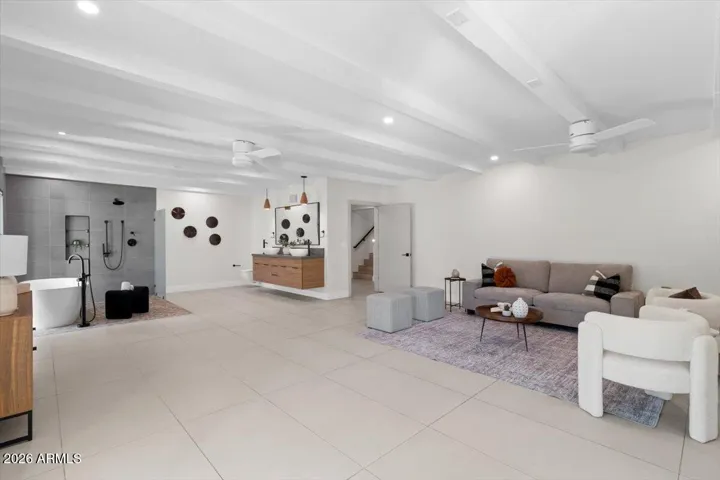 Lower level 5th bedroom, living area, bathroom