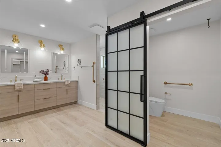ADA compliant water closet with grab bars