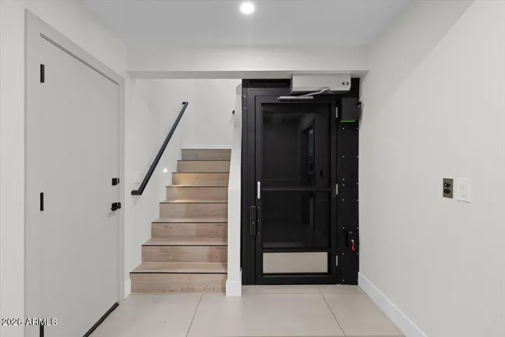 Entrance from the garage leads right to the elevator