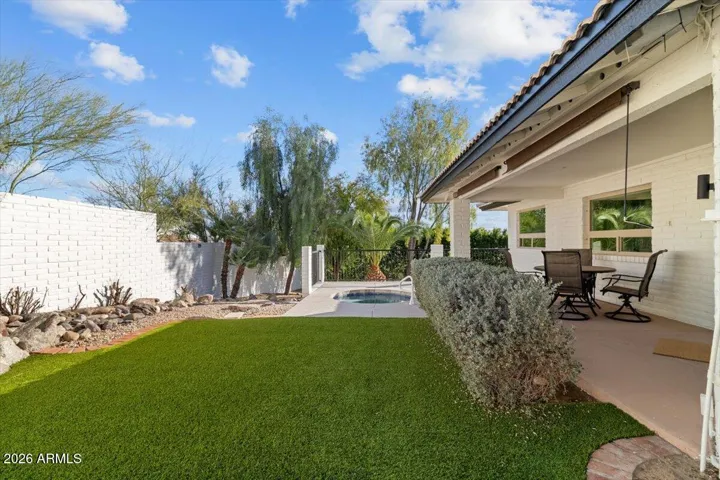 Courtyard off of Primary Suite with hot tub and views!
