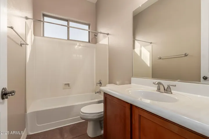 Full bathroom next to downstairs bedroom