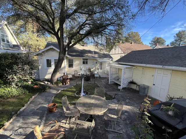Rear view of main house/garage to the right