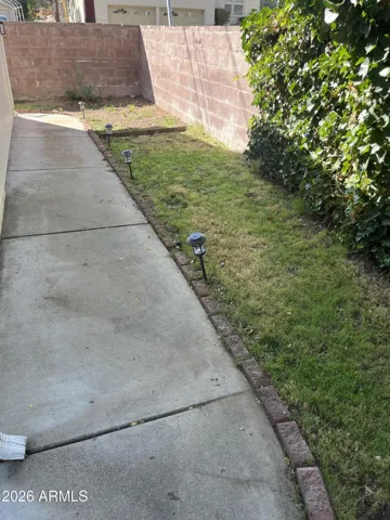 Dog run/side of Guest house grassy area