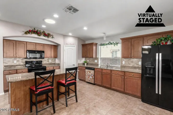 We have virtually staged the kitchen to remove the table.