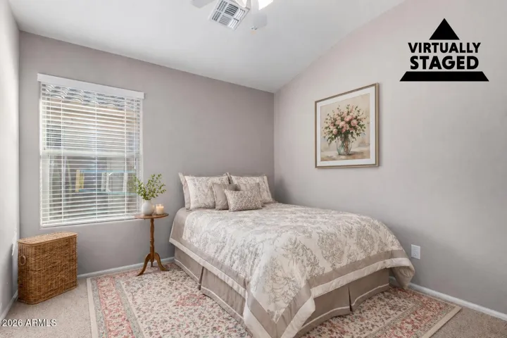 This room has been virtually staged to a neutral bedroom color scheme.