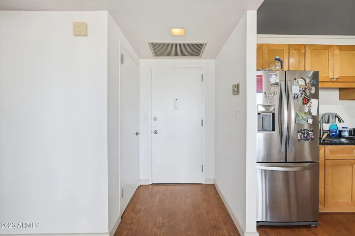 The kitchen’s proximity to the entry makes everyday living and entertaining convenient in this Landmark Towers residence. Located a quiet distance from the elevator and near the staircase.