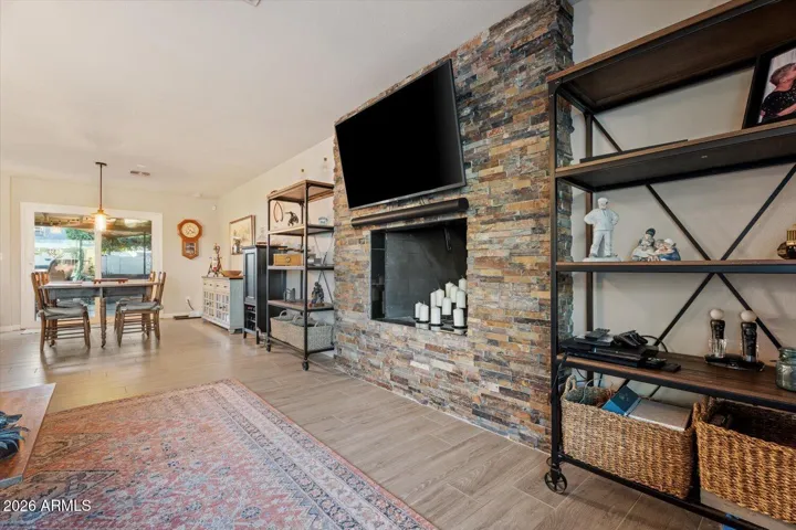 Looking from family room into the kitchen dining space and access to backyard.