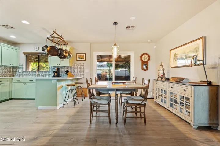 Perfect dining area leading to outdoor patio for indoor//outdoor dining all year long.