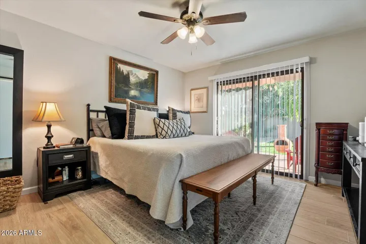 Primary bedroom with separate access to backyard.