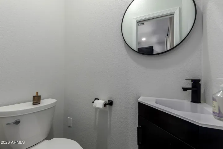 Convenient half bath newly constructed on main living floor for added convenience.