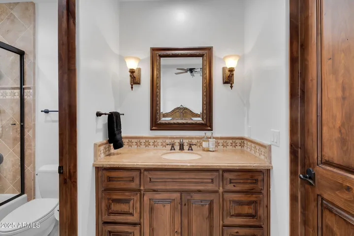 Sophisticated guest bedroom 1 bathroom with luxurious finishes and thoughtful design details