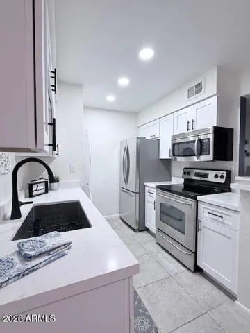 Fully equipped kitchen to cook and enjoy all your meals AND stackable laundry for easy packing for long stays!