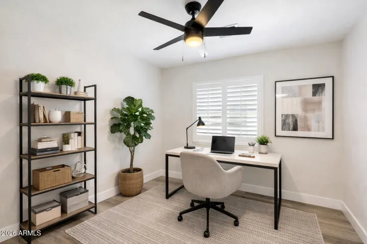 Office + Closet. This imaged is virtually staged.