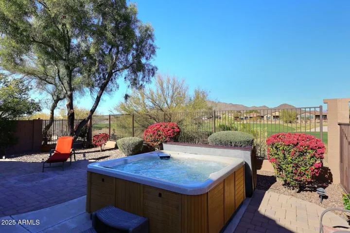 Heated Spa overlooks golf course and mountain views