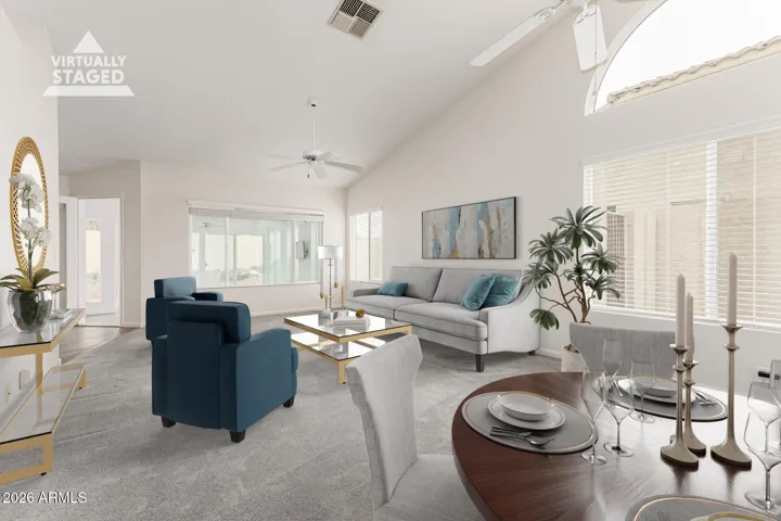 Virtually staged as Family Room and Dining Room.