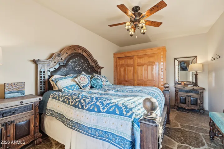 5th Bedroom for residence, stone floors, window to courtyard