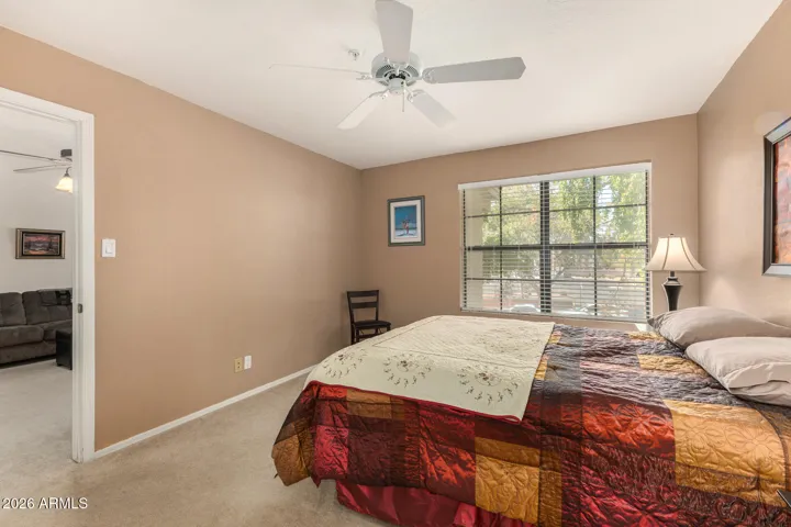 has windows overlooking mature landscaping.