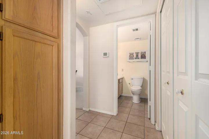from the entry. Bathroom, Laundry & linen closet are here.