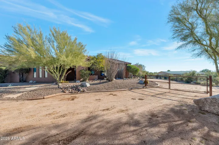 South side of property with RV gate and large space for RVs