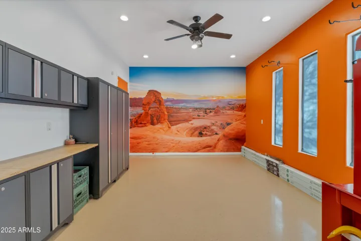 Attached to Garage, Temp controlled motorcycle, tool or hobby room w/custom storage