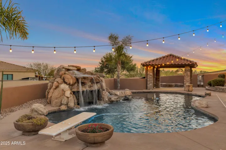 Twilight pool, grotto waterfall, cabana