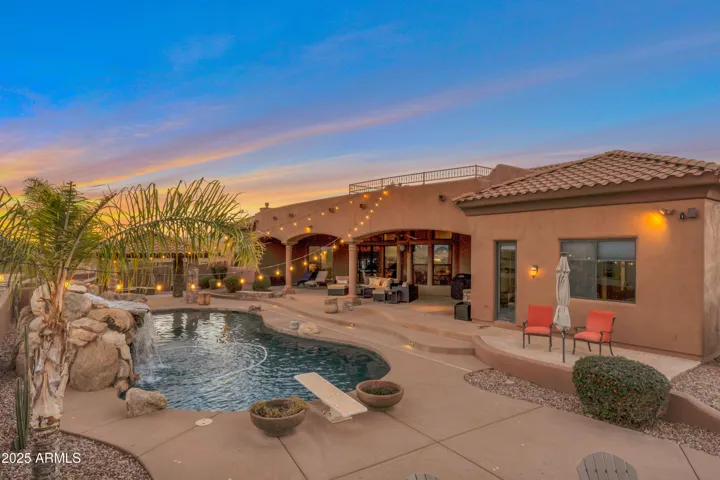 Twilight pool area and patio
