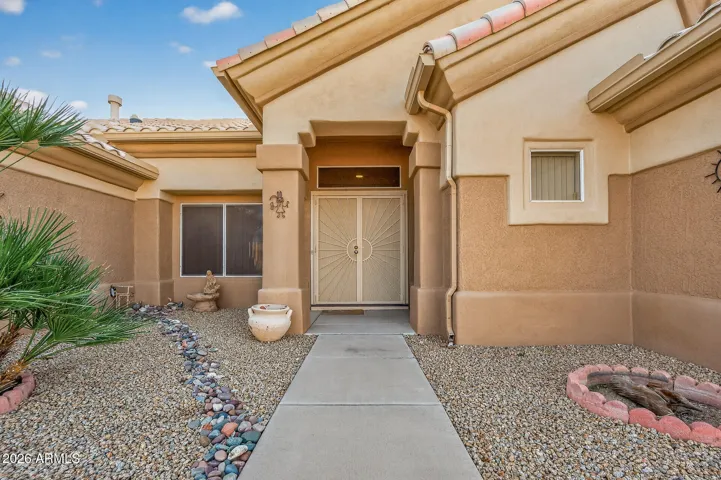 Notice the dramatic double door entry.