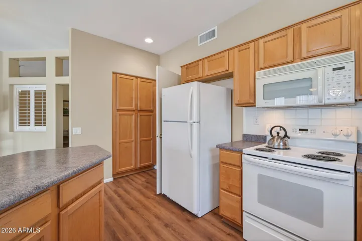 Notice the double door pantry.