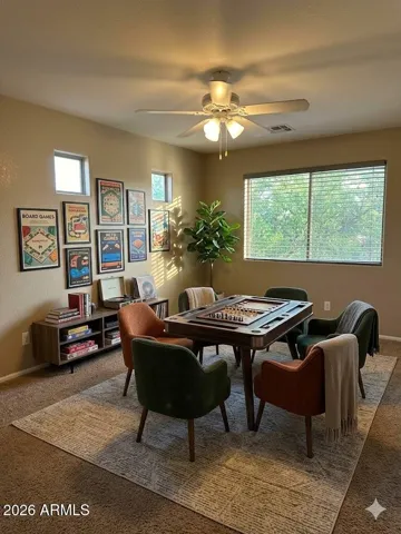 Spacious upstairs loft—perfect as a family playroom or media space- Photos may include AI-generated or enhanced elements; actual property may differ