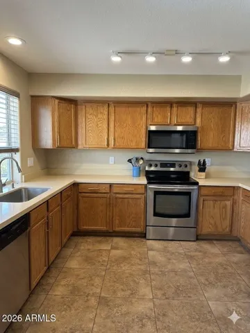 Kitchen -Photos may include AI-generated or enhanced elements; actual property may differ.