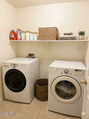 Spacious Laundry area - Photos may include AI-generated or enhanced elements; actual property may differ.