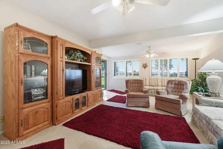Second Bedroom or currently being used as expanded family room; great for watching sports or movies.