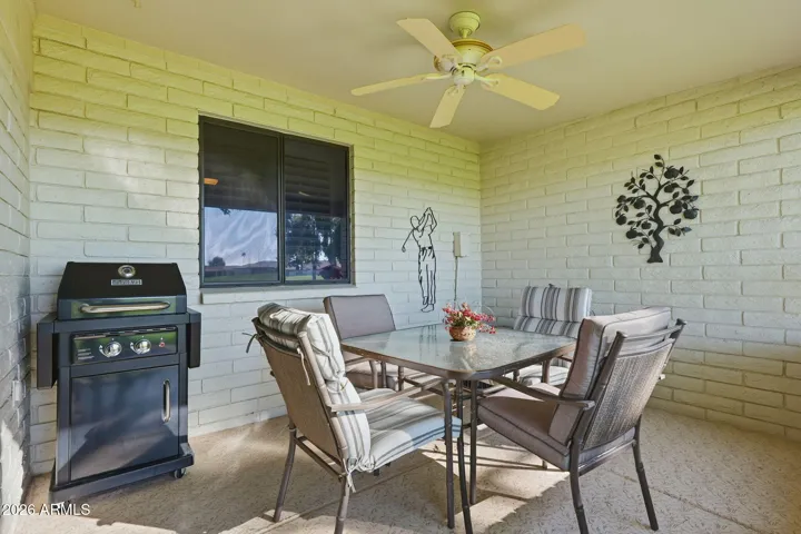 South-facing covered patio. Great area for winding down the day watching the sunset or watching golfers.