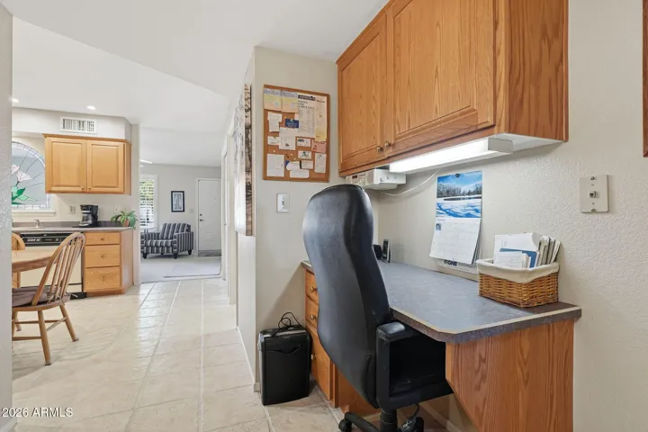 Office desk just off kitchen.