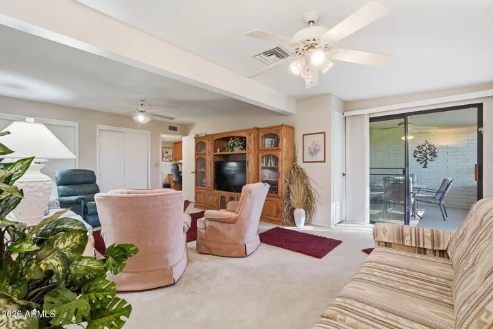 Second Bedroom or currently being used as expanded family room with access to the south-covered patio to the golf course.