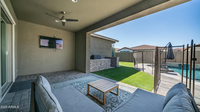 BACKYARD FACING NORTH. ALWAYS SHADED ON PATO