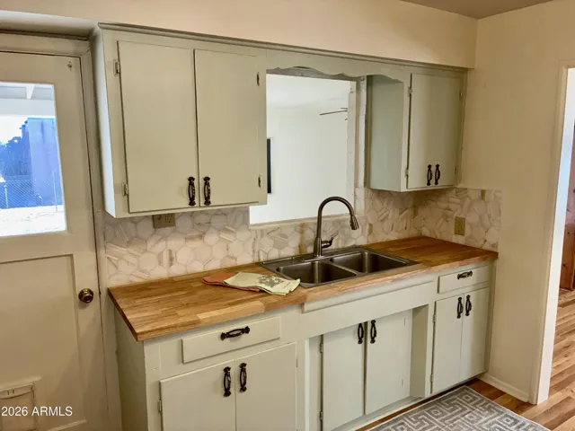 Gorgeous U-shaped Kitchen, with Access to the F Room, Dining Room, Hallway, and Back Yard.