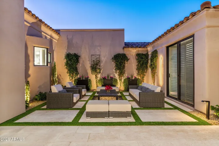 Courtyard is gorgeous and welcoming in the evening! Guest casita on the right