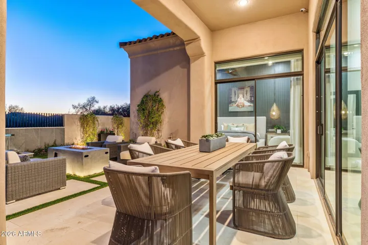 Outdoor dining under a covered patio