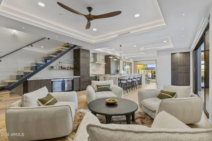 Open kitchen and lounge space. Custom, soft, ambient lighting