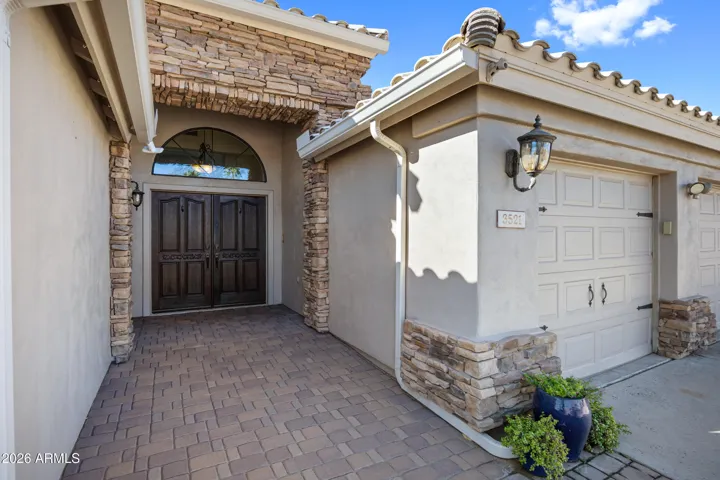 Stone accents and pavers at front walk way.....