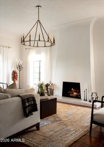 Soft light, layered textures, and a hearth designed for lingering moments.