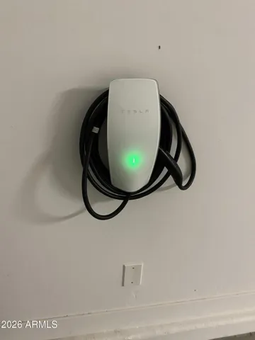 TESLA CHARGER THAT CAN BE CONVERTED FOR OTHER ELECTRIC CARS