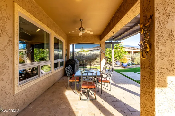 Covered patio with electronic sunshade