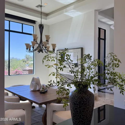 Formal dining room with large view window to enjoy breathtaking sunset views