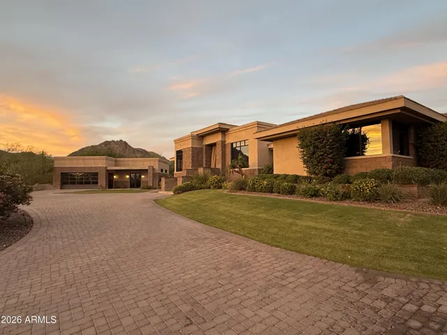 Circular drive at front of estate at dusk