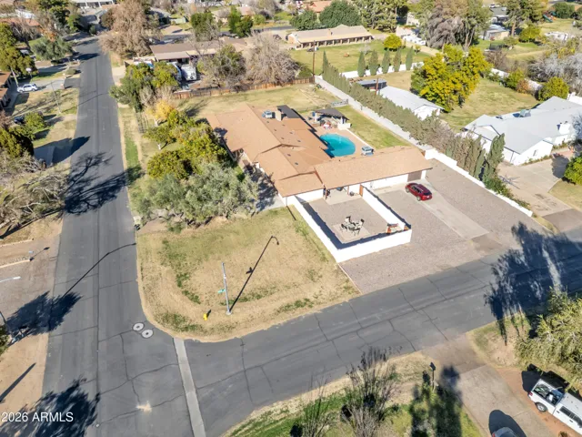 Aerial view of detached guest house with separate entrance and private backyard area.