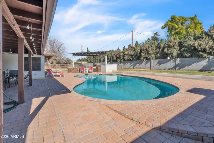 Deep sparkling, resurfaced swimming pool.