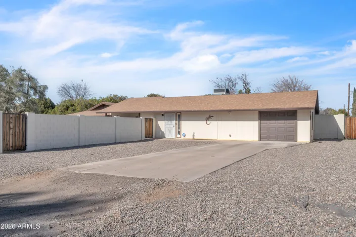 This is where the guest house becomes a true asset — private entry, its own parking area, and the flexibility buyers rarely find.