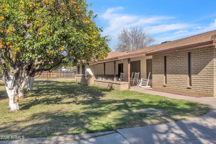 Expansive covered porch where neighbors gather.